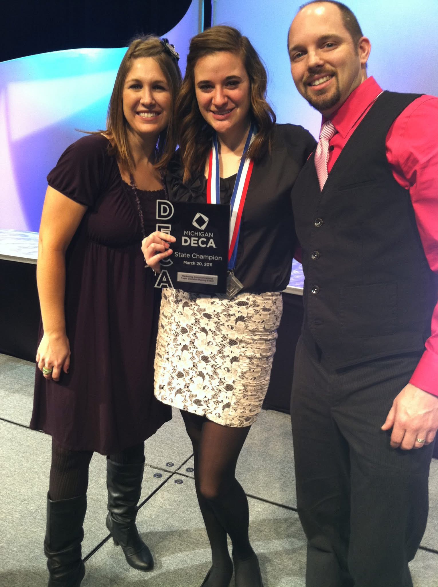 Brian Winter with co-moderator Julia Dalrymple and state champion Jessie Smude